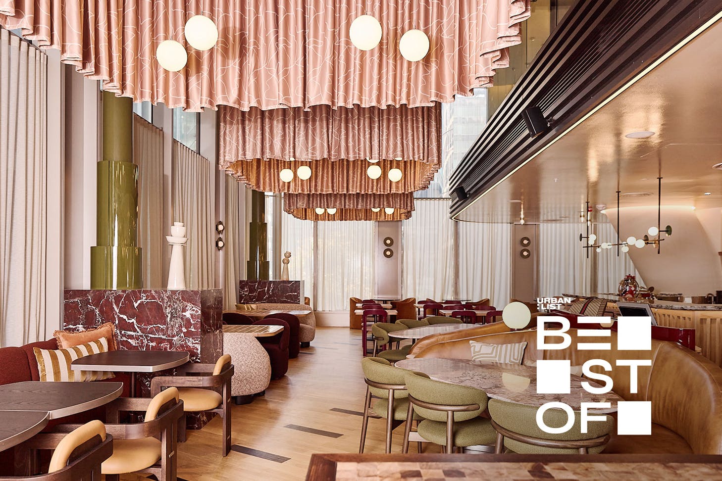 The pink hued dining room at Bar Lettera, one of the best restaurants in North Sydney